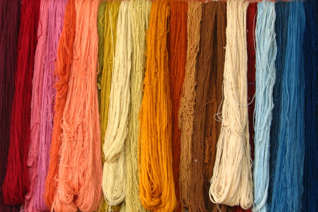 Layers of multicolored yarn symbolizing separation agreements at Clemmons Family Law. Photo by Skitterphoto from Pexels